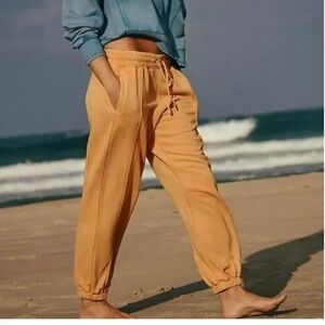 Free people sprint to the finish sweatpant tangerine orange size medium